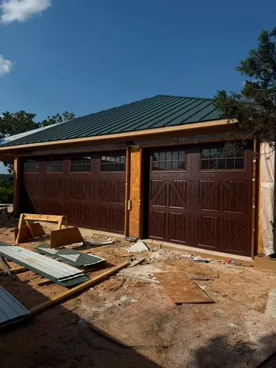 Custom wood carriage garage doors installed by the Tovar crew