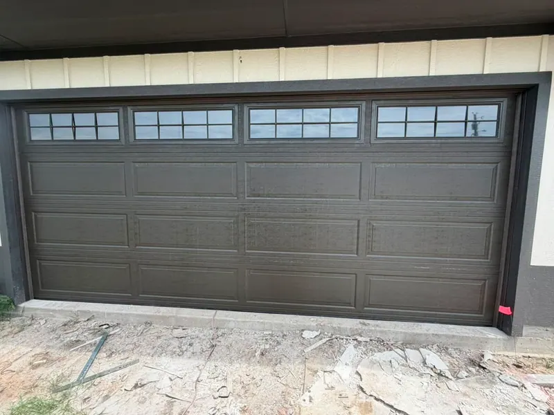 New gray raised panel garage door installation